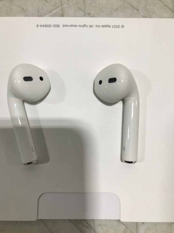 Photo 2 of Apple AirPods (2nd Generation) Wireless Earbuds with Lightning Charging Case Included. Over 24 Hours of Battery Life, Effortless Setup. Bluetooth Headphones for iPhone