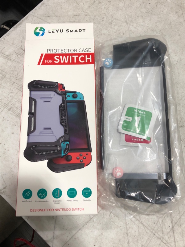 Photo 2 of LEYUSMART Protector for Nintendso Switch, Slim Heavy Duty TPU Cover, Comfortable Grip with HD Tempered Glass Screen Protector & 2 Thumb Caps Black