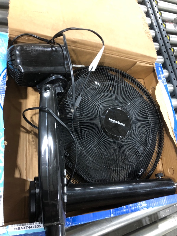 Photo 1 of Amazon Basics Oscillating Dual Blade Standing Pedestal Fan with Remote - 16-Inch, Black
