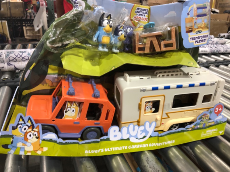 Photo 2 of Bluey Ultimate Caravan Adventures - Caravan Playset and Three 2.5-3" Figures & 4WD Family Vehicle with 2 Surfboards
