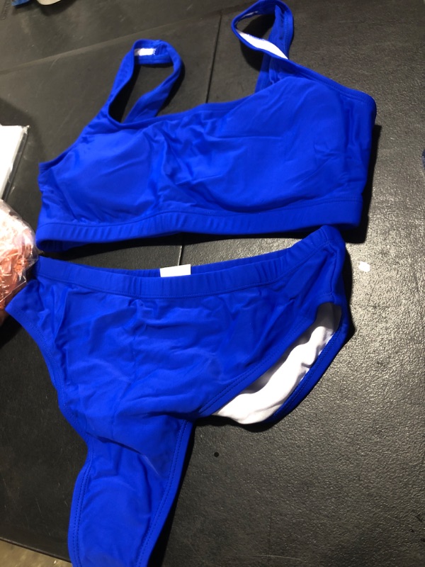 Photo 1 of 2 piece swim suit size Lrg 