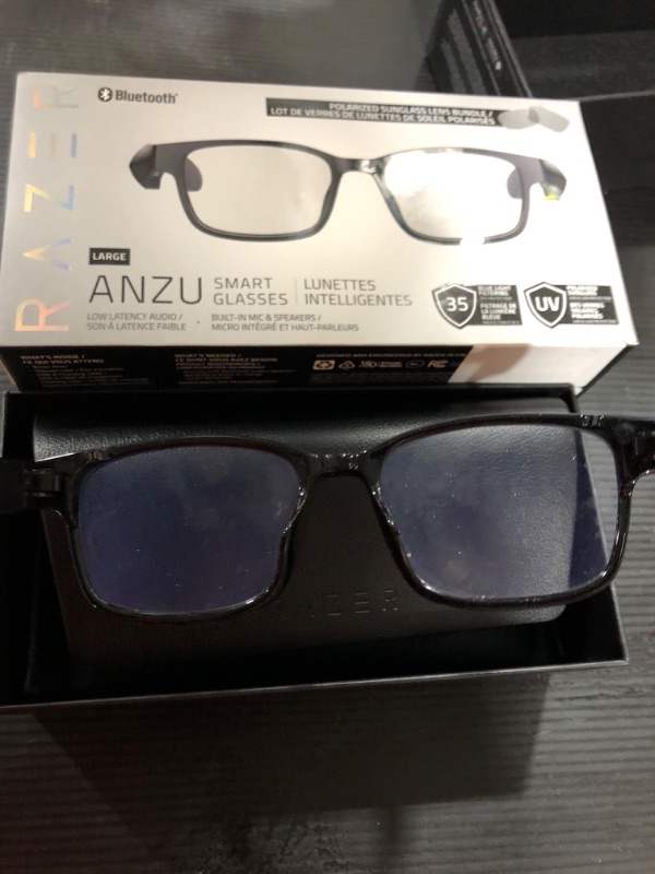Photo 2 of Razer Anzu Smart Glasses: Blue Light Filtering & Polarized Sunglass Lenses - Low Latency Audio - Built-in Mic & Speakers - Touch & Voice Assistant Compatible - 5hrs Battery - Rectangle/Large **USED**
