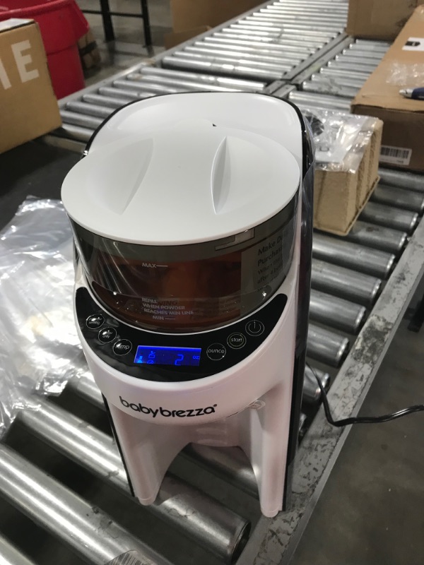 Photo 2 of New and Improved Baby Brezza Formula Pro Advanced Formula Dispenser Machine - Automatically Mix a Warm Formula Bottle Instantly - Easily Make Bottle with Automatic Powder Blending