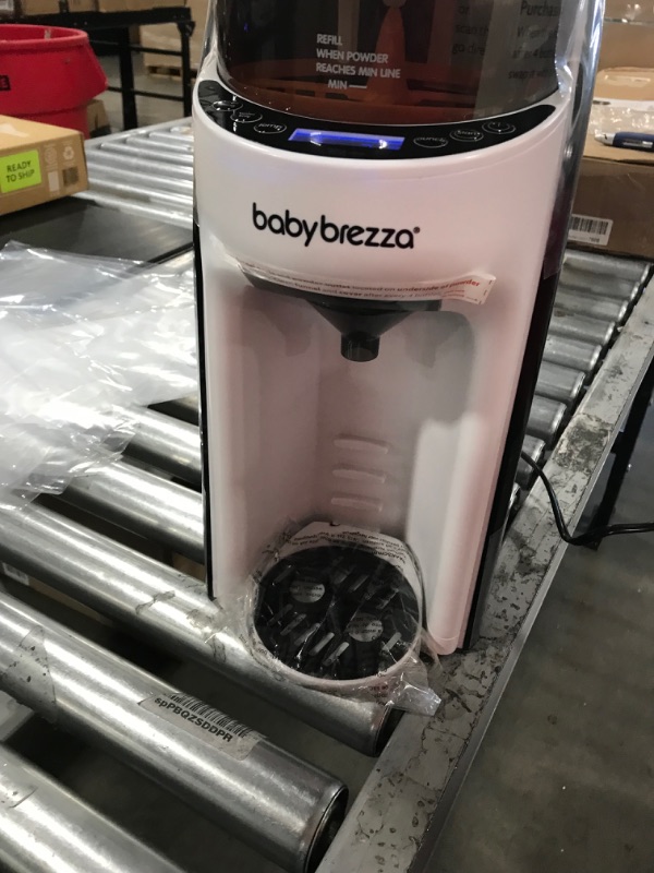 Photo 1 of New and Improved Baby Brezza Formula Pro Advanced Formula Dispenser Machine - Automatically Mix a Warm Formula Bottle Instantly - Easily Make Bottle with Automatic Powder Blending