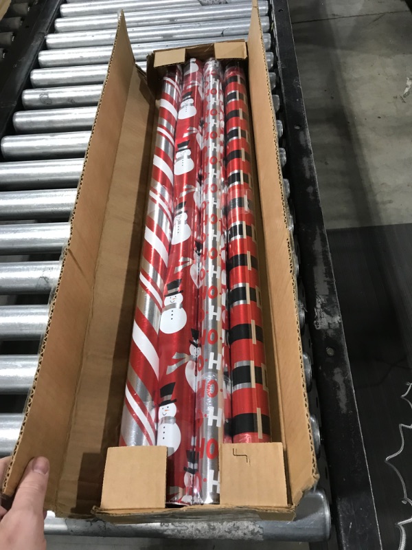 Photo 2 of American Greetings Christmas Reversible Wrapping Paper Bundle, Red, Black and Silver, Candy Cane Stripe, Snowmen and Santa Belt (4 Rolls, 80 sq. ft.) Red, Black, and Silver