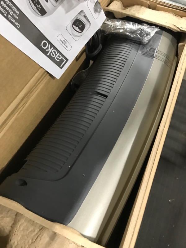 Photo 1 of Lasko Oscillating Digital Ceramic Tower Heater for Home with Adjustable Thermostat, Timer and Remote Control, 23 Inches, 1500W, Silver, 755320