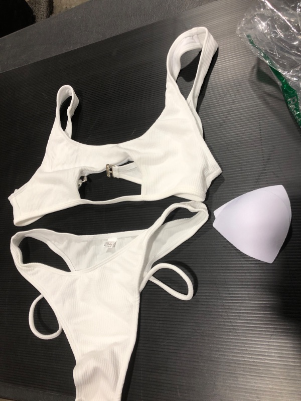 Photo 1 of 2 piece size Lrg swim suit white 