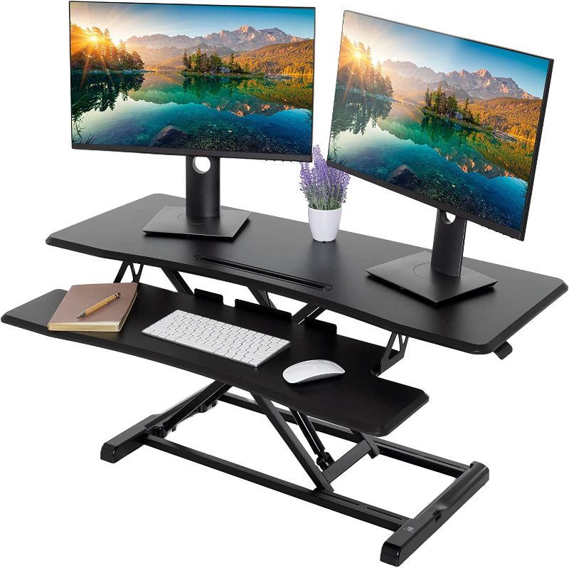 Photo 1 of TechOrbits Standing Desk Converter - 42 Inch MDF Wood, Adjustable Height Sit to Stand Up Desk Riser for Home Office - Computer, Laptop & Dual Monitor Workstation - Black
