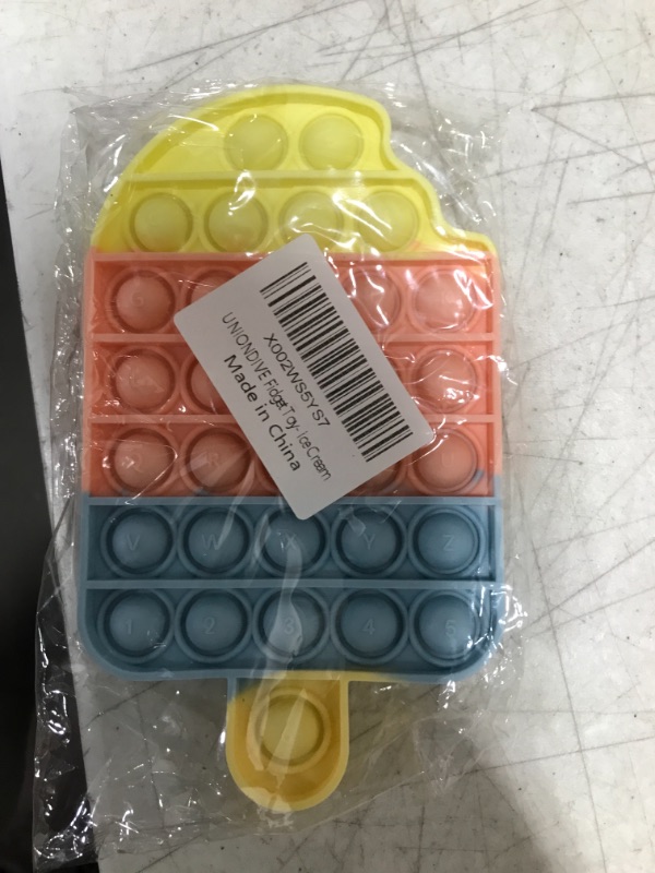 Photo 2 of Fidget toy set (12 pieces) and large ice cream fidget pop toy