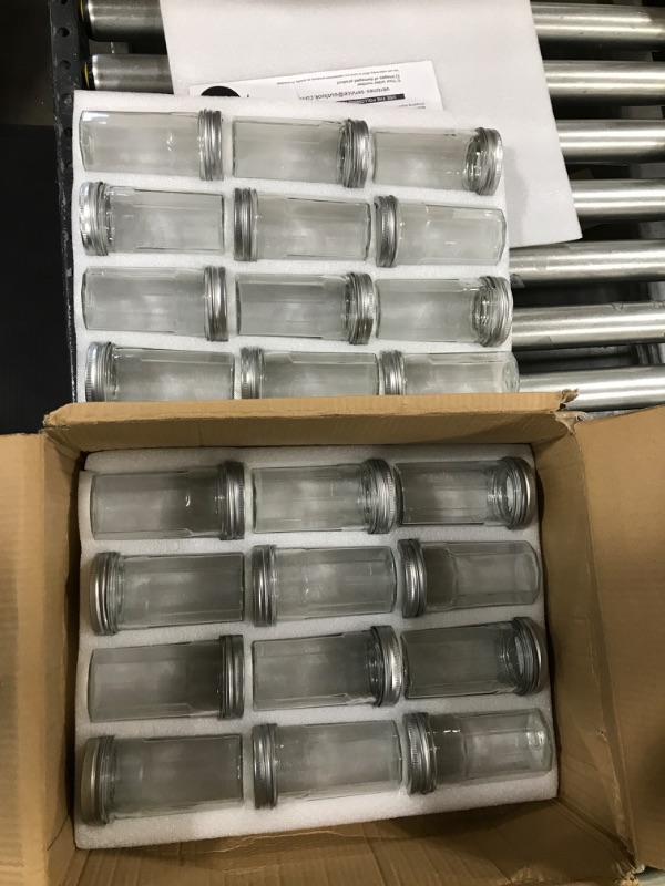 Photo 1 of 24pk of glass small canning jars 