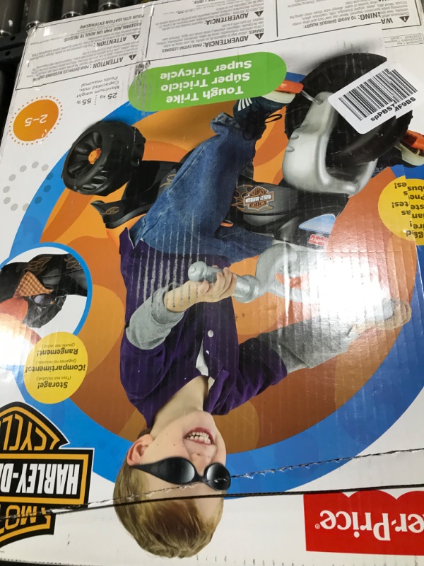 Photo 1 of Fisher-Price Harley-Davidson Tricycle with Handlebar Grips and Storage Area, Multi-Terrain Tires, Tough Trike [Amazon Exclusive]