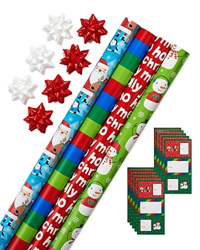 Photo 1 of American Greetings Christmas Wrapping Paper Kit for Kids - 4 Rolls with Gridlines, 7 Bows and 30 Gift Tags (41-Count, 120 Sq. Ft)