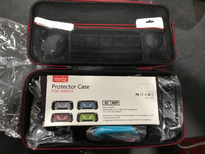 Photo 1 of HEYSTOP Carrying Case Compatible with Nintendo Switch Portable Travel All Protective Storage Case Screen Protector Thumb Grips Caps for Nintendo Switch Accessories with Joy-con Grips and PlayStand