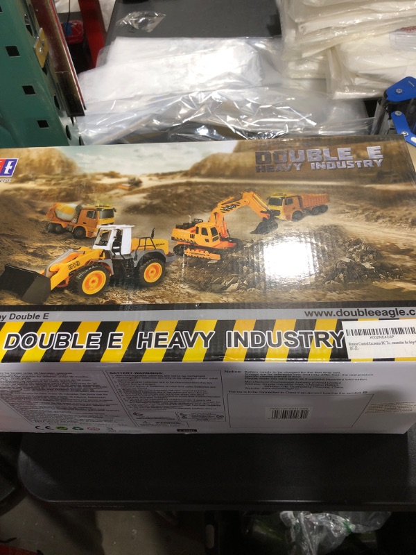 Photo 2 of DOUBLE E Remote Control Excavator RC Toy 1:20 RC Excavator Toy 3 Separate Motors Construction Tractor, 11 Channel Rechargeable RC Truck with Lights Sounds 2.4Ghz Transmitter for Boys Girls Kids