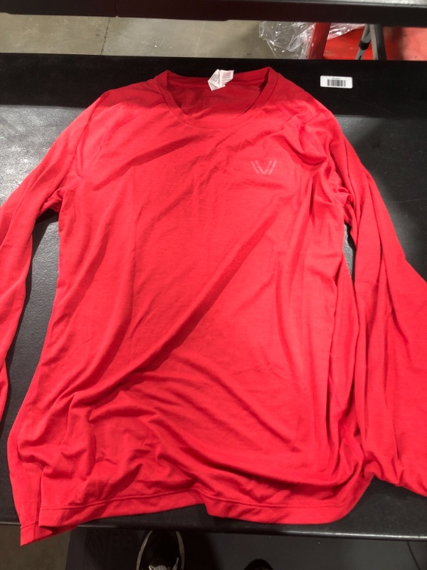 Photo 1 of Athletic shirt size medium