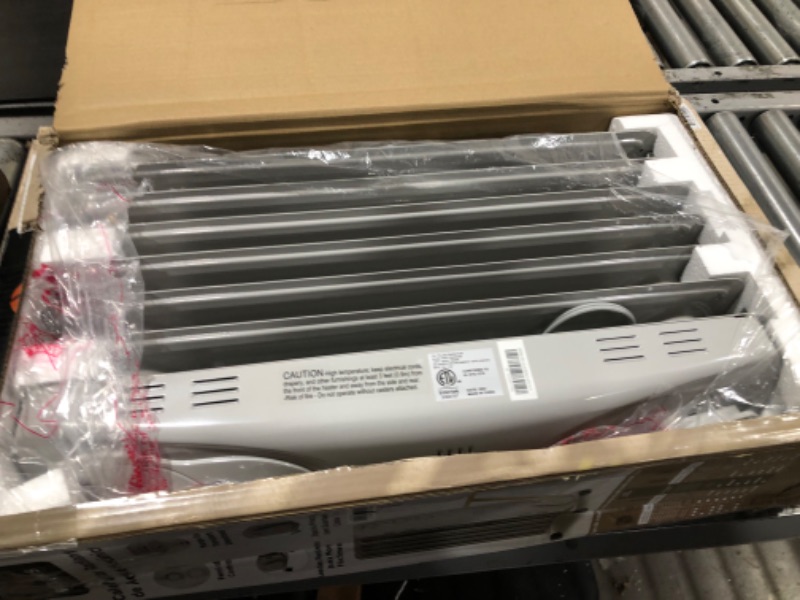 Photo 1 of PELONIS PHO15A2AGW, Basic Electric Oil Filled Radiator, 1500W Portable Full Room Radiant Space Heater with Adjustable Thermostat, White, 26.10 x 14.20 x 11.00 in