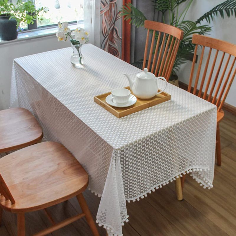 Photo 1 of Yovmefna Table Cloths Rectangle White Lace Table Cloths for Parties Wedding Banquet Holiday Long Dinner Tables (Small Dots, 60"X120")
