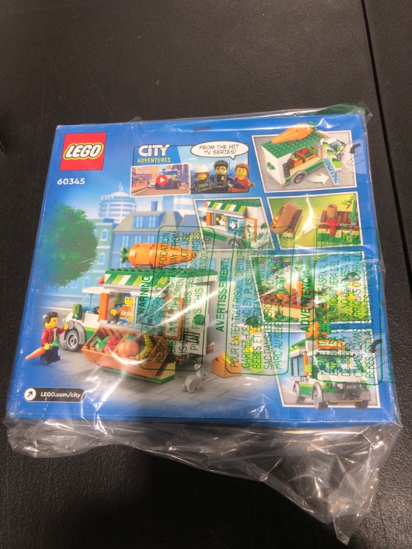 Photo 2 of LEGO City Farmers Market Van 60345 Building Toy Set for Kids, Boys, and Girls Ages 5+ Mobile Farm Shop Playset with 3 Minifigures (310 Pieces)