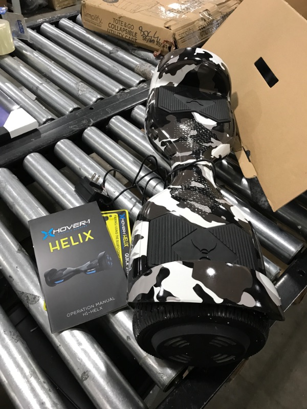 Photo 2 of Hover-1 Helix Electric Hoverboard | 7MPH Top Speed, 4 Mile Range, 6HR Full-Charge, Built-in Bluetooth Speaker, Rider Modes: Beginner to Expert Hoverboard Camo