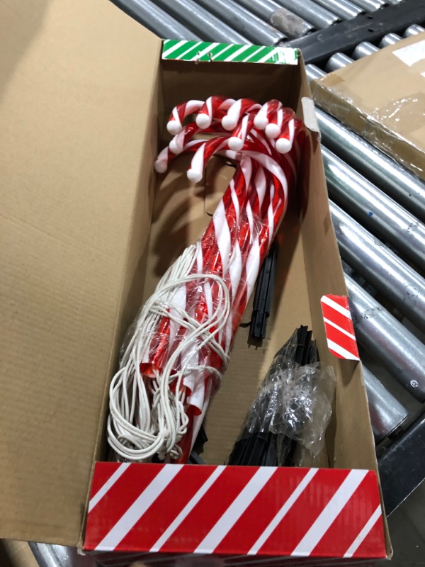 Photo 2 of GAGALIFE 22” Christmas Candy Canes Lights 10Pcs Red, Outdoor Candy Cane Decorations Path Lights with Stake Red & White 22"