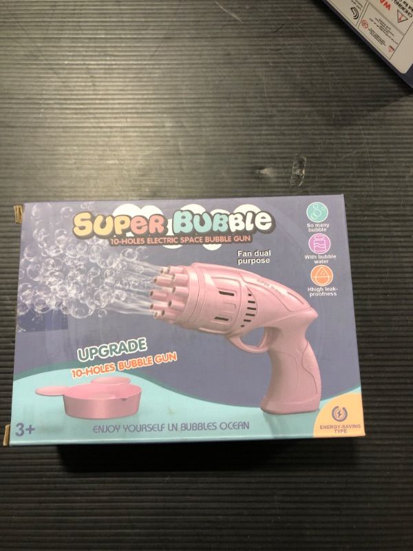 Photo 1 of bubble gun blower pink 
 