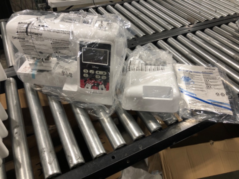 Photo 1 of Brother PE550D Embroidery Machine, 125 Built-in Designs Including 45 Disney Designs, 4" x 4" Hoop Area, Large 3.2" LCD Touchscreen, USB Port, 9 Font Styles