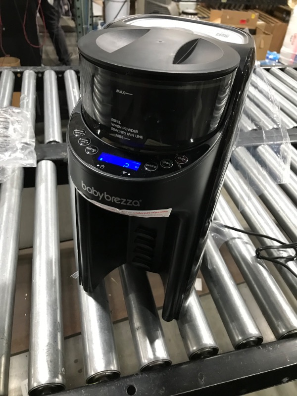Photo 1 of New and Improved Baby Brezza Formula Pro Advanced Formula Dispenser Machine - Automatically Mix a Warm Formula Bottle Instantly - Easily Make Bottle with Automatic Powder Blending