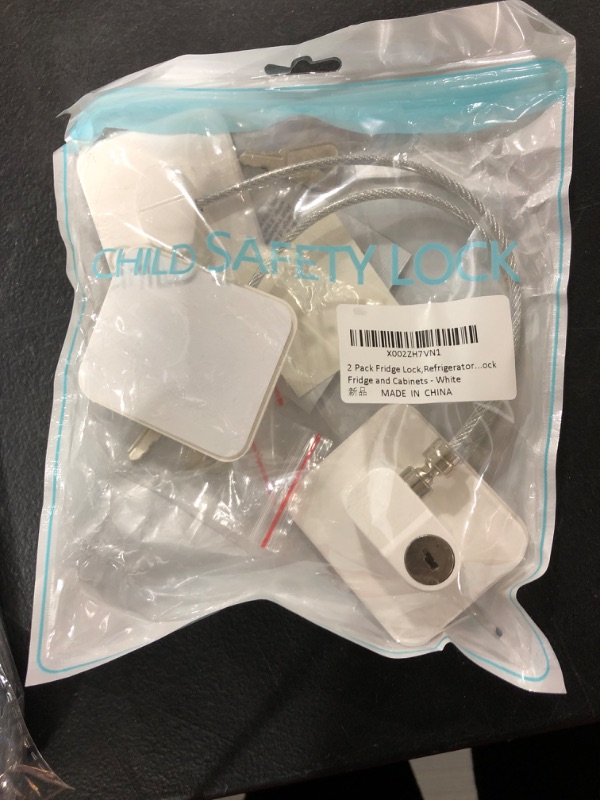 Photo 1 of 2 Pack Fridge Lock,Refrigerator Locks,Freezer Lock with 4 Key for Child Safety,Locks to Lock Fridge and Cabinets - White https://a.co/d/51GE2mS