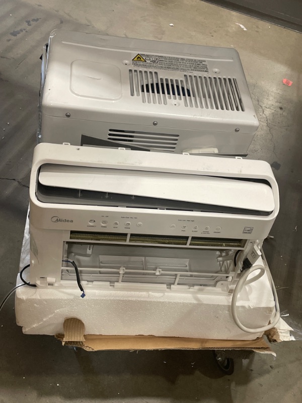 Photo 2 of DAMAGED//USED: Midea 12,000 BTU U-Shaped Smart Inverter Window Air Conditioner–Cools up to 550 Sq. Ft., Ultra Quiet with Open Window Flexibility, Works with Alexa/Google Assistant, 35% Energy Savings, Remote Control 19.17 x 21.97 x 13.46 inches

