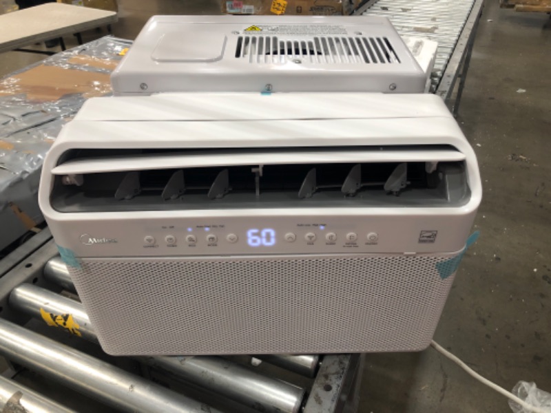 Photo 2 of ***PARTS ONLY*** Midea 8,000 BTU U-Shaped Inverter Window Air Conditioner WiFi, 9X Quieter, Over 35% Energy Savings ENERGY STAR MOST EFFICIENT
*Damaged*