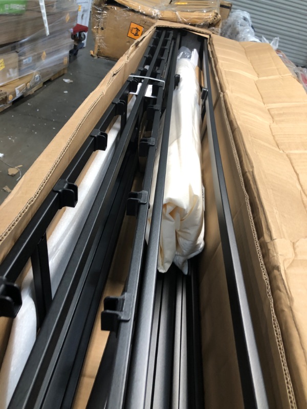 Photo 1 of **DENT AND MISSING SLATS**

Amazon Basics Smart Box Spring Bed Base, 9-Inch Mattress Foundation - King Size, Tool-Free Easy Assembly

