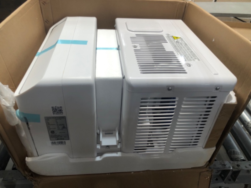 Photo 3 of TESTED POWERS ON***
Midea 8,000 BTU U-Shaped Smart Inverter Window Air Conditioner–Cools up to 350 Sq. Ft., Ultra Quiet with Open Window Flexibility, Works with Alexa/Google Assistant, 35% Energy Savings, Remote Control
