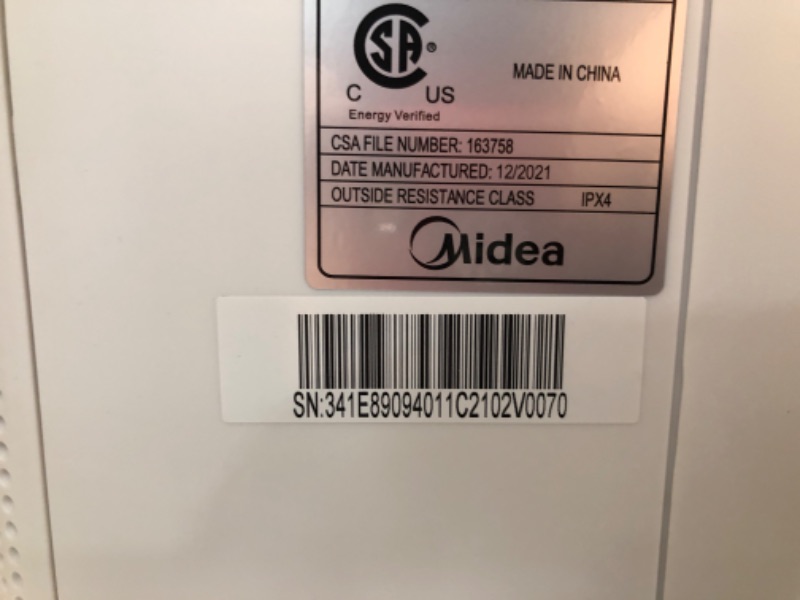 Photo 3 of TESTED POWERS ON**
Midea 8,000 BTU U-Shaped Smart Inverter Window Air Conditioner–Cools up to 350 Sq. Ft., Ultra Quiet with Open Window Flexibility, Works with Alexa/Google Assistant, 35% Energy Savings, Remote Control
