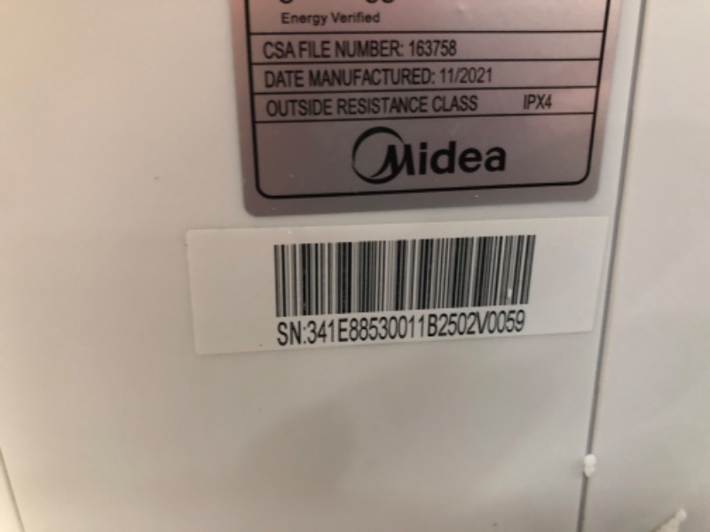 Photo 2 of TESTED POWERS ON**
Midea 8,000 BTU U-Shaped Smart Inverter Window Air Conditioner–Cools up to 350 Sq. Ft., Ultra Quiet with Open Window Flexibility, Works with Alexa/Google Assistant, 35% Energy Savings, Remote Control
