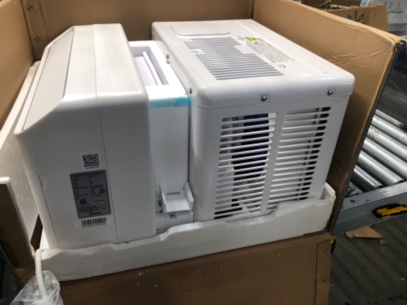 Photo 3 of TESTED POWERS ON**
Midea 8,000 BTU U-Shaped Smart Inverter Window Air Conditioner–Cools up to 350 Sq. Ft., Ultra Quiet with Open Window Flexibility, Works with Alexa/Google Assistant, 35% Energy Savings, Remote Control
