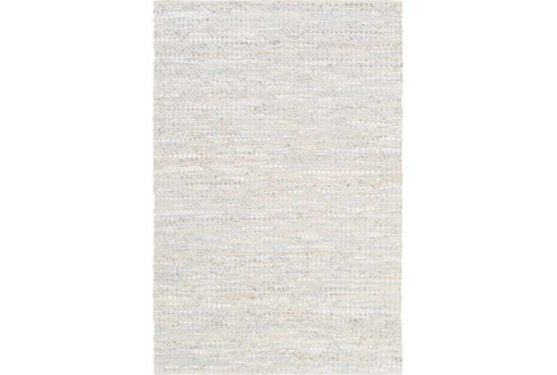 Photo 1 of 7'4" x 10' woven ivory rug 
