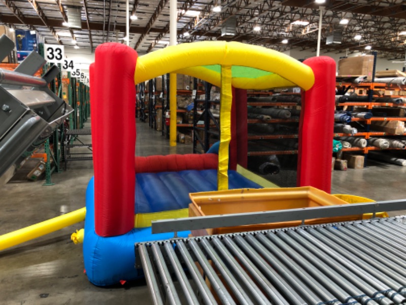 Photo 2 of Little Tikes Jump n Slide Bouncer with Arched Canopy Overhead Cover, Plus Heavy Duty Blower, Stakes, Repair Patches, and Storage