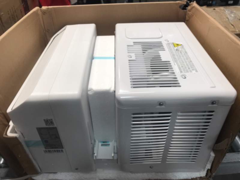 Photo 3 of TESTED POWERS ON*
Midea 8,000 BTU U-Shaped Smart Inverter Window Air Conditioner–Cools up to 350 Sq. Ft., Ultra Quiet with Open Window Flexibility, Works with Alexa/Google Assistant, 35% Energy Savings, Remote Control
