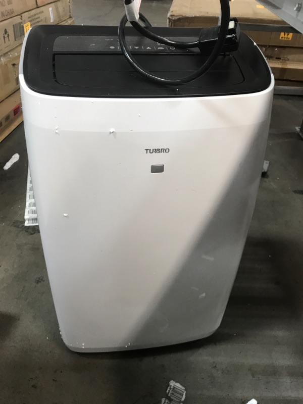 Photo 3 of POWERS ON BUT MAKES SHAKING NOISE FROM INSIDE* DAMAGED FROM INSIDE*
TURBRO Greenland 14,000 BTU Portable Air Conditioner, Dehumidifier, & Fan, 3-in-1 Floor AC for Rooms up to 600 Sq Ft, Sleep Mode, Timer, Backlit Remote Included (10,000 BTU SACC)
