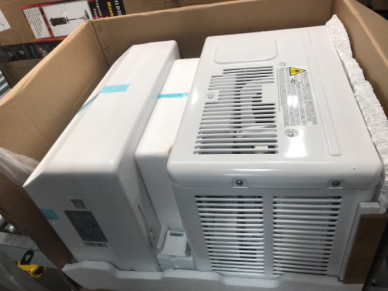 Photo 3 of TESTED POWERS ON**
Midea 12,000 BTU U-Shaped Smart Inverter Window Air Conditioner–Cools up to 550 Sq. Ft., Ultra Quiet with Open Window Flexibility, Works with Alexa/Google Assistant, 35% Energy Savings, Remote Control
