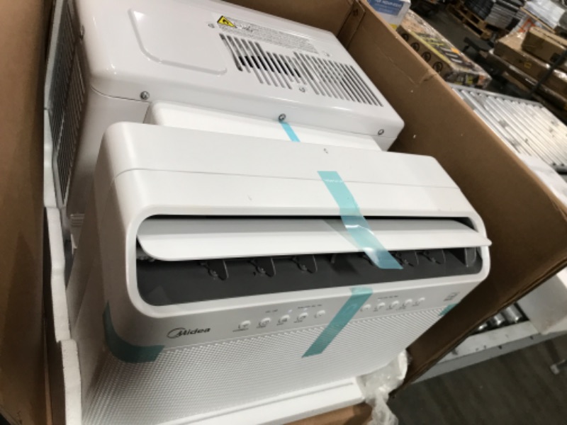 Photo 4 of TESTED POWERS ON*
Midea 10,000 BTU U-Shaped Smart Inverter Window Air Conditioner–Cools up to 450 Sq. Ft., Ultra Quiet with Open Window Flexibility, Works with Alexa/Google Assistant, 35% Energy Savings, Remote Control
