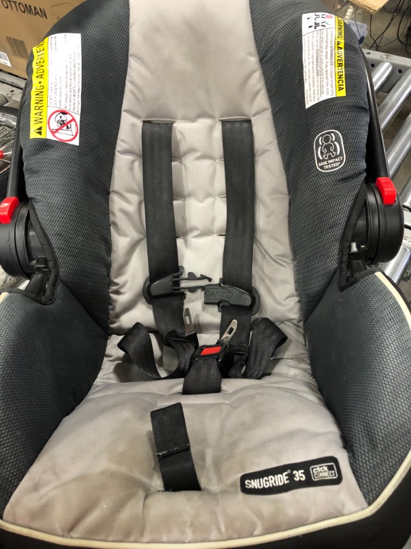 Photo 3 of Graco FastAction Fold Jogger Travel System | Includes the FastAction Fold Jogging Stroller and SnugRide 35 Infant Car Seat, Gotham
**USED** **DIRTY**