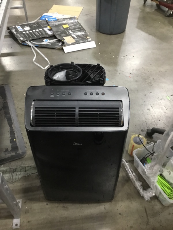 Photo 2 of Midea Duo 14,000 BTU (12,000 BTU SACC) Smart HE Inverter Ultra Quiet Portable Air Conditioner with Heat-Cools Up to 550 Sq. Ft., Works with Alexa/Google Assistant, Includes Remote Control & Window Kit
