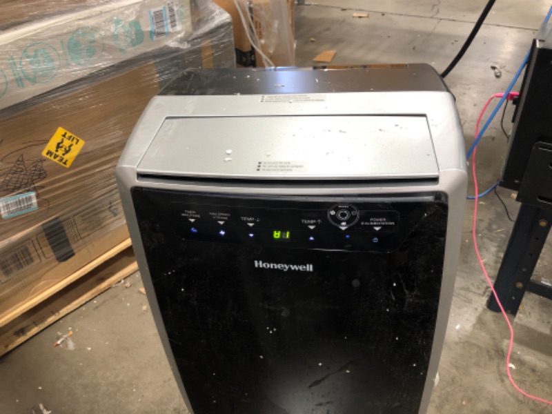 Photo 3 of Honeywell (Black/Silver) Classic Portable Air Conditioner w Dehumidifier & Fan, Cools Rooms Up to 700 Sq. Ft. w Drain Pan & Insulation Tape, MN4CFS9, 29.400
