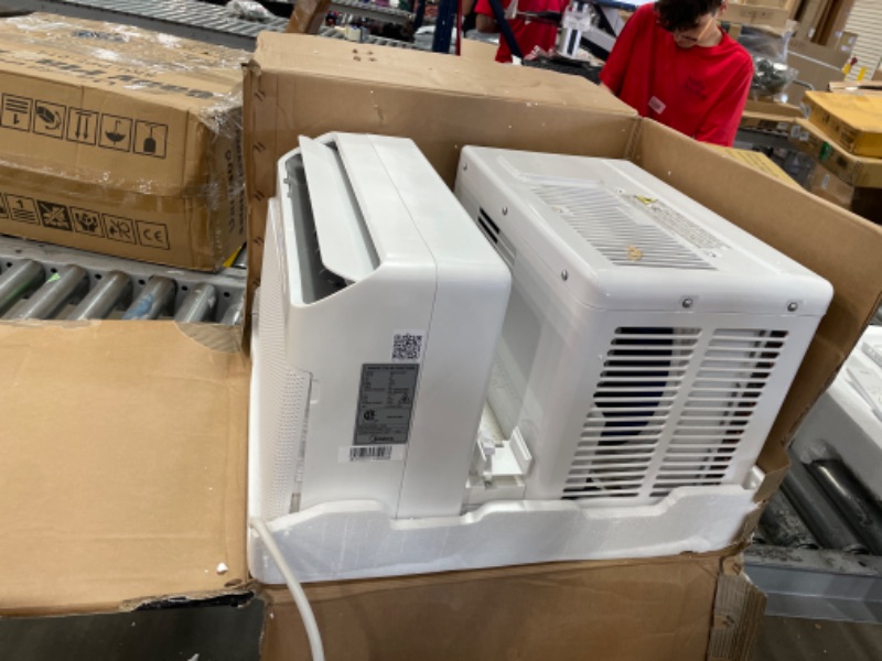 Photo 1 of Midea 12,000 BTU U-Shaped Smart Inverter Window Air Conditioner–Cools up to 550 Sq. Ft., Ultra Quiet with Open Window Flexibility, Works with Alexa/Google Assistant, 35% Energy Savings, Remote Control
