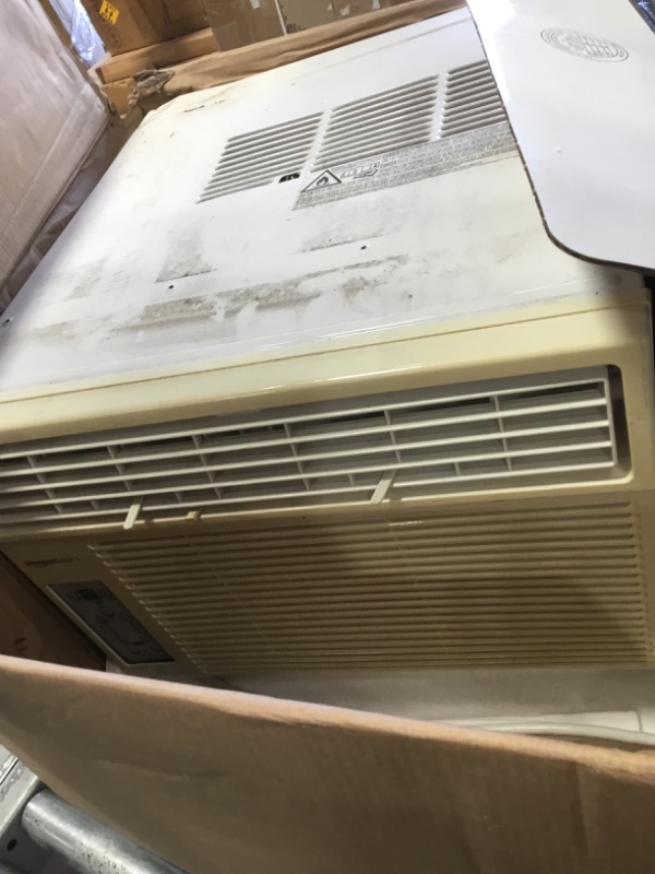 Photo 3 of **PARTS ONLY**

Amazon Basics Window-Mounted Air Conditioner with Remote - Cools 550 Square Feet, 12000 BTU, Energy Star
