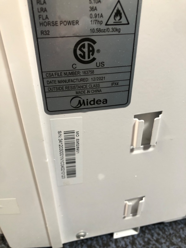 Photo 1 of Midea 8,000 BTU EasyCool Window Air Conditioner, Dehumidifier and Fan - Cool, Circulate and Dehumidify up to 350 Sq. Ft., Reusable Filter, Remote Control