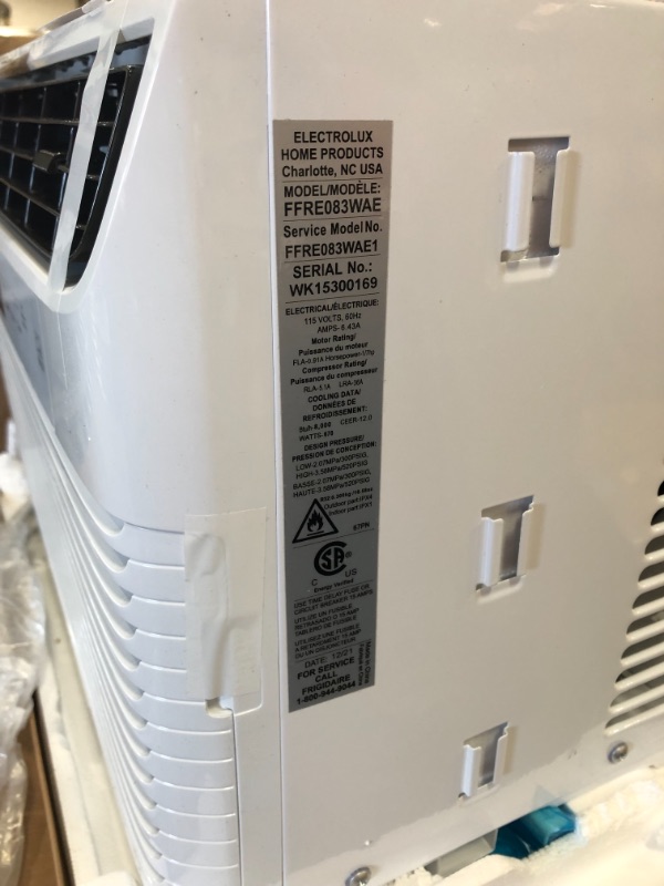 Photo 5 of **DAMAGED** Frigidaire Energy Star 8,000 BTU 115V Window-Mounted Mini-Compact Air Conditioner with Full-Function Remote Control,
