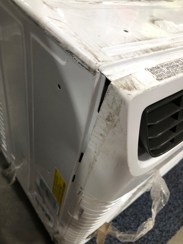 Photo 4 of **MAJOR COSMETIC DAMAGE** USED. WORKS GOOD**MISSING REMOTE**
Frigidaire Window-Mounted Room Air Conditioner, 15,100 BTU, in White
