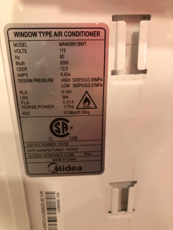 Photo 4 of **NONFUNCTIONAL*** PARTS ONLY*** STUCK IN AN ERROR ** MINOR COSMETIC DAMAGE***
Midea MAW08R1BWT 8,000 BTU Window AC W/Remote
